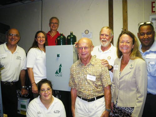 St. John Rescue Members Celebrate Oxygen Generator