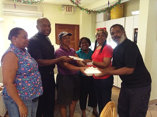 Winner of $500 Dolphin Market Gift Certificate Donates to Our Lady of Mount Carmel Soup Kitchen