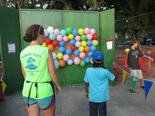 Bouncy House, Race Cars and More Draw St. John Youth to Children’s Village