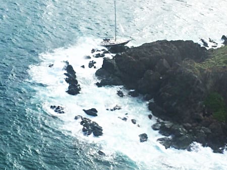Six Boaters Rescued After Sailing Vessels Grounds on Rocky Point Off Coral Bay