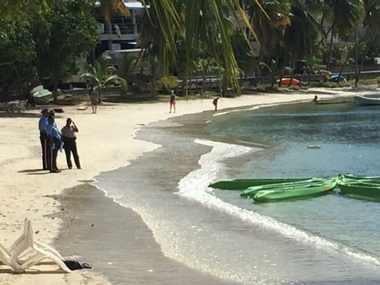 VIPD and VIPA Officers Cover-up Daylight Capture of Naked Lady on Cruz Bay Beach
