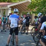 Stephanie Guyer Stevens giving bikers directions