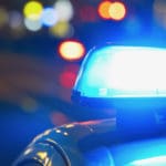Police,Car,On,The,Street,At,Night