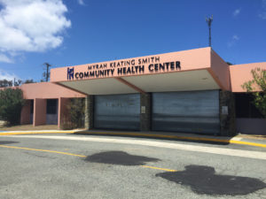 Metal service doors shutter the entrance to the Myrah Keating Smith Clinic, damaged in the 2017 hurricanes. (File photo)