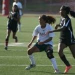 girls playing soccer