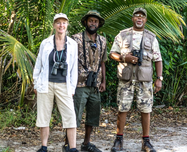 Guide Mario “Bird Man” Francis (r.) and co-guide Don Spencer (c.) spent an entire day with author Lisa Freeman, introducing her to the birding hot spots of St. Thomas. Mario is founder of the St. Thomas chapter of the USVI Audubon. | Photo courtesy of Randy Freeman.