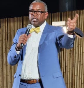 Gov. Albert Bryan Jr. addresses the crowd at a town hall meeting Tuesday night to discuss the Hull Bay boat ramp project. (Source photo by Shaun Pennington)