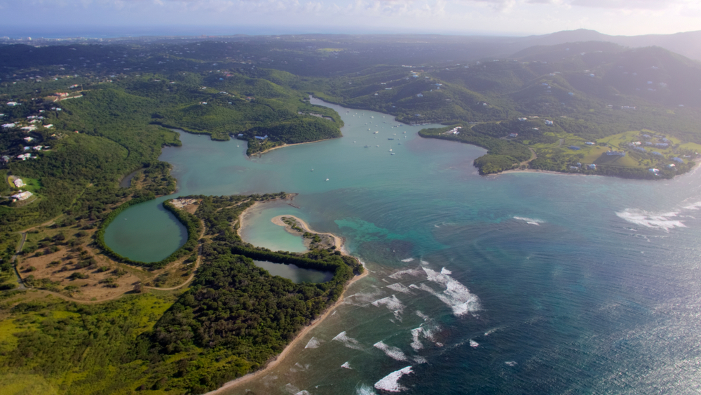 An aerial view of the Salt River Bay Columbus Landing site on St. Croix, which each year draws dozens of Easter campers. (Shutterstock photo)
