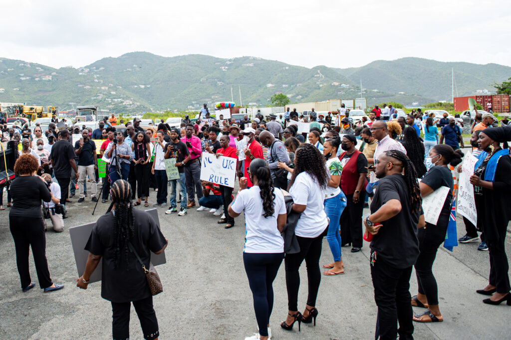 Protesters gather outside Government House on Monday on Tortola in the British Virgin Islands. (Photo by Cleave)