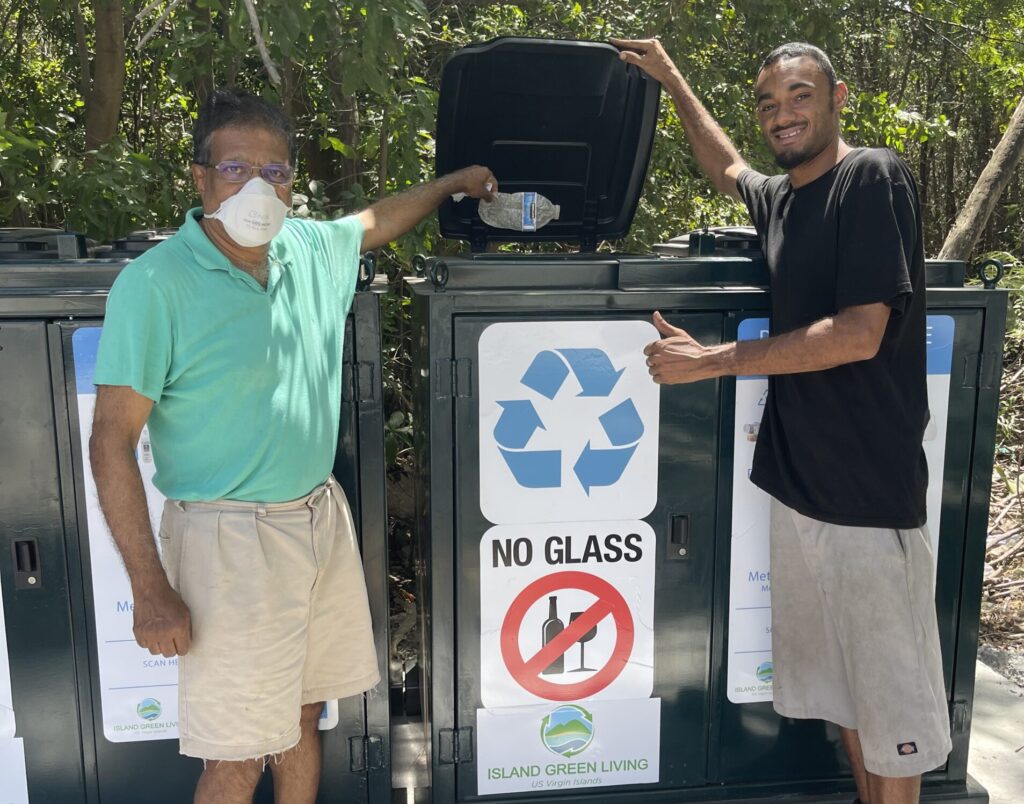 Board President Harith Wickrema & Staff Member CJ Scatliffe with new recycling bin. (Photo courtesy of Island Green Living)