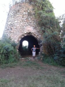 A hiker at the Bodkins Mill ruins. (Photo by Olasee Davis)