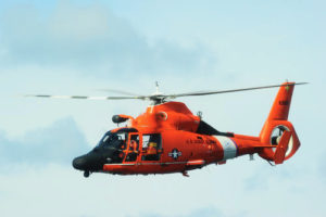 A Coast Guard MH-65 Dolphin helicopter. (File photo by Petty Officer 3rd Class Stephen Lehmann, from Coast Guard archives) .