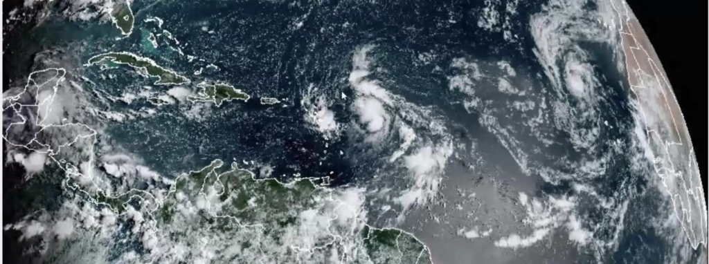A satellite image shows Invest 91L approaching the U.S. Virgin Islands and Puerto Rico on Friday morning. (Screenshot from webinar)