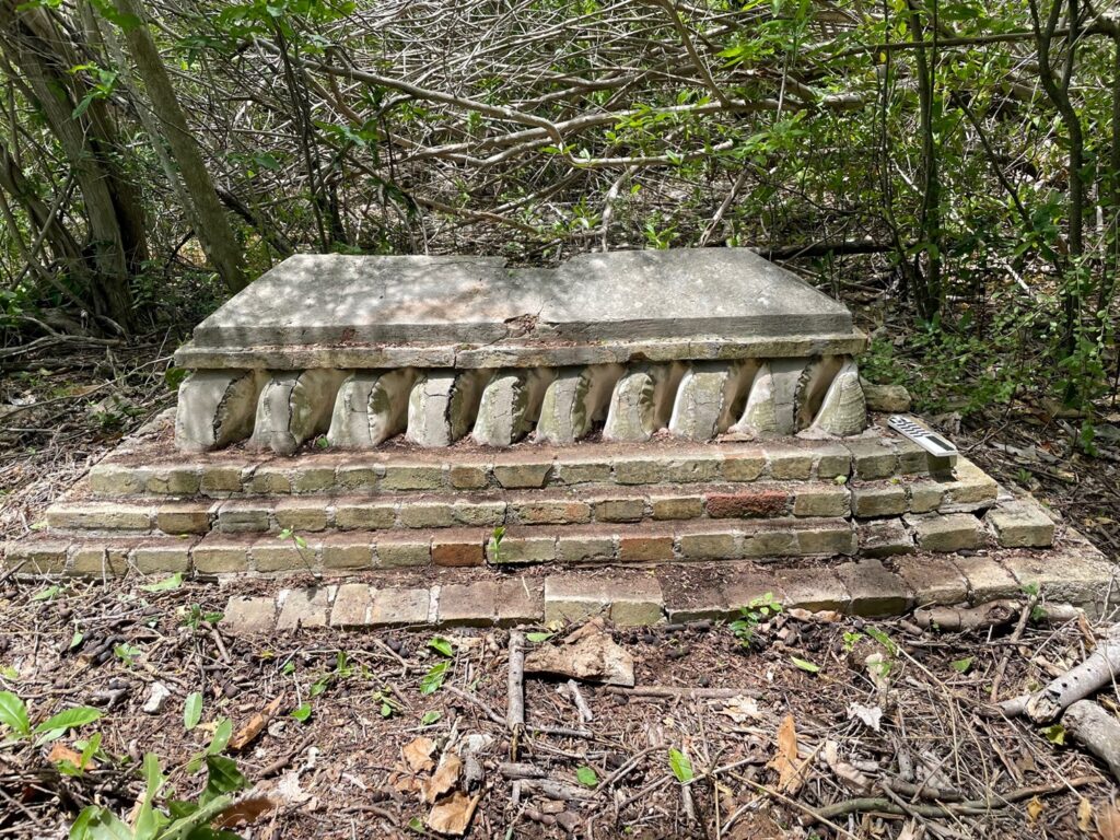 A slave grave decorates with conch shells and Danish yellow and red bricks. These bricks came on Danish ships to the Danish West Indies. (Photo by Barbara Walsh)