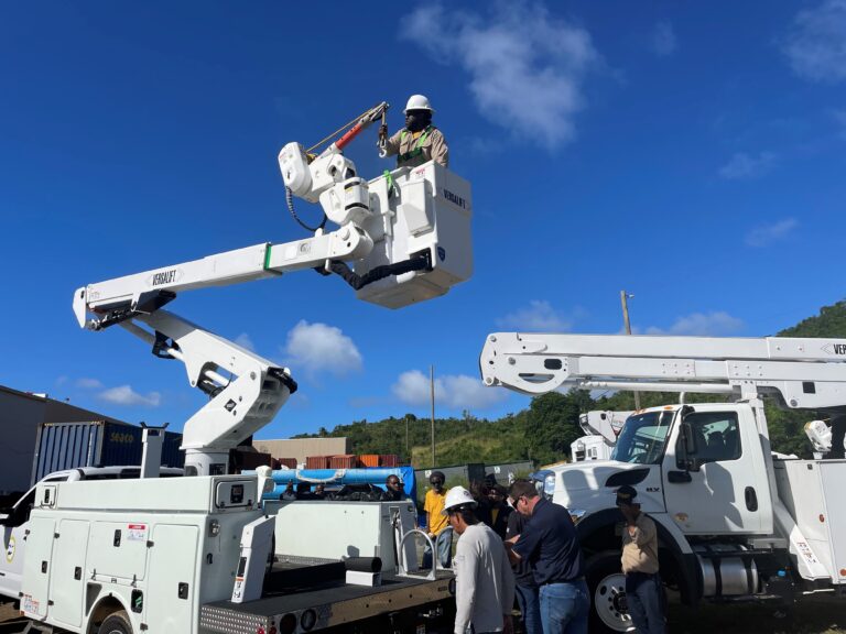 WAPA Line Workers Receive New Bucket Truck Training, Install Lights for ‘Miracle on Main Street’