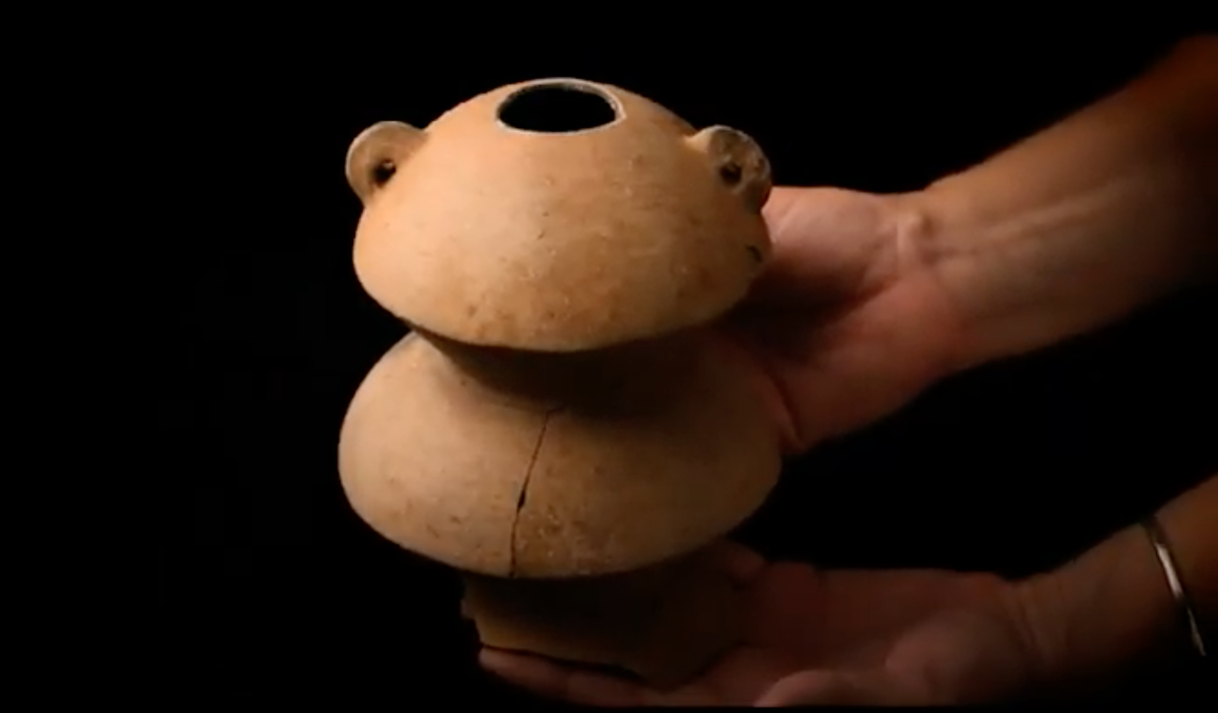 Archaeologists discovered this ancient ceramic vessel at Main Street. (Screenshot from the Charlotte Amalie Saladoid Excavation documentary)