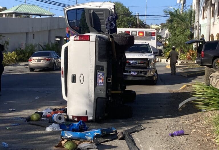 A pickup truck sits on its side after a single-vehicle accident Tuesday morning in Red Hook on St. Thomas. (Submitted photo)