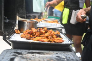 Grilling wings to success.(Source photo by Joshua Barry Crawford)