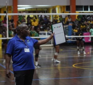 ISV Head Coach Isaac Raphael gives instructions during the semi-final match at the CAZOVA U19 Volleyball Championships. (Photo by Sean Morrison)