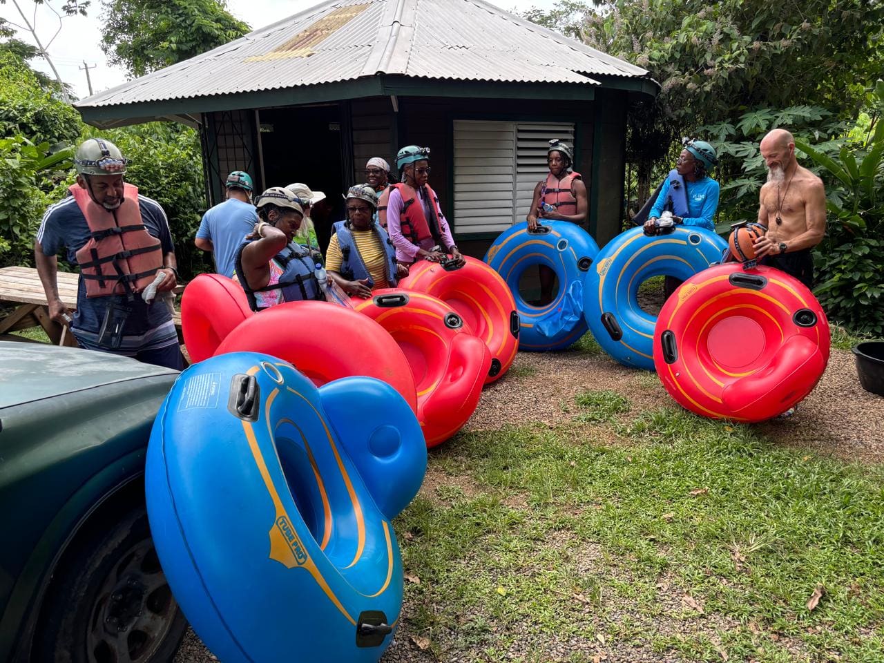 Members of the St. Croix Hiking Association get ready for river tubing at St. Herman’s Blue Hole National Park in Belize. The adventurous hikers went river tubing through the cave's pitch-dark environment with headlights on their helmets. (Photo by Nick Drayton)