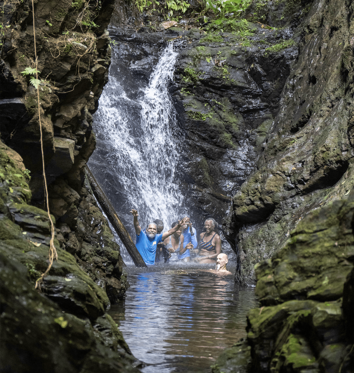 Members of the St. Croix Hiking Association enjoy a sweet reward after hiking the Ni Witz Trail in southern Belize. (Photo by Rudy Saki)