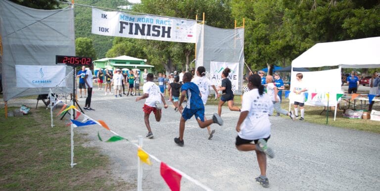 10K youth participants cross the finish line at the M2M Road Race on Saturday at Magens Bay on St. Thomas. (Source photo by Jonelle-Alexis Jackson)