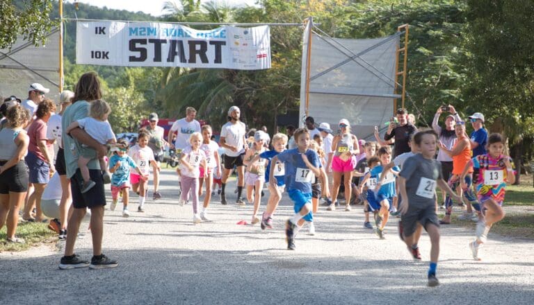 The 1K Kids Race gets off to an enthusiastic start during the M2M event Saturday at Magens Bay on St. Thomas. (Source photo by Jonelle-Alexis Jackson)