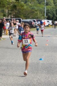 Young runner Arianna, on her way to winning the 1K children's run on Saturday at Magens Bay on St. Thomas. (Source photo by Jonelle-Alexis Jackson)