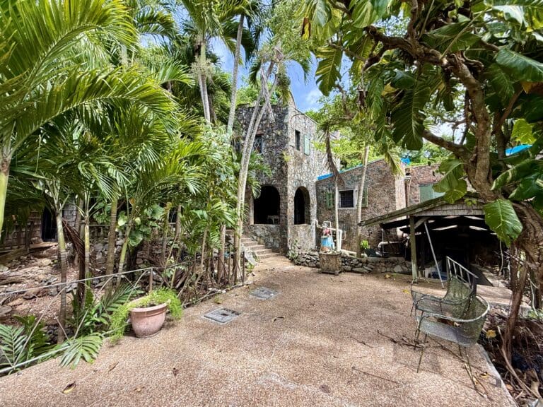 The guardhouse features thick stone walls with arched windows and passageways. (Photo by Seaglass Properties)