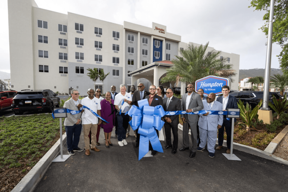 Officials cut the ribbon to officially open Hampton by Hilton St. Thomas. (Photo by William Torrillo/Mango Media)
