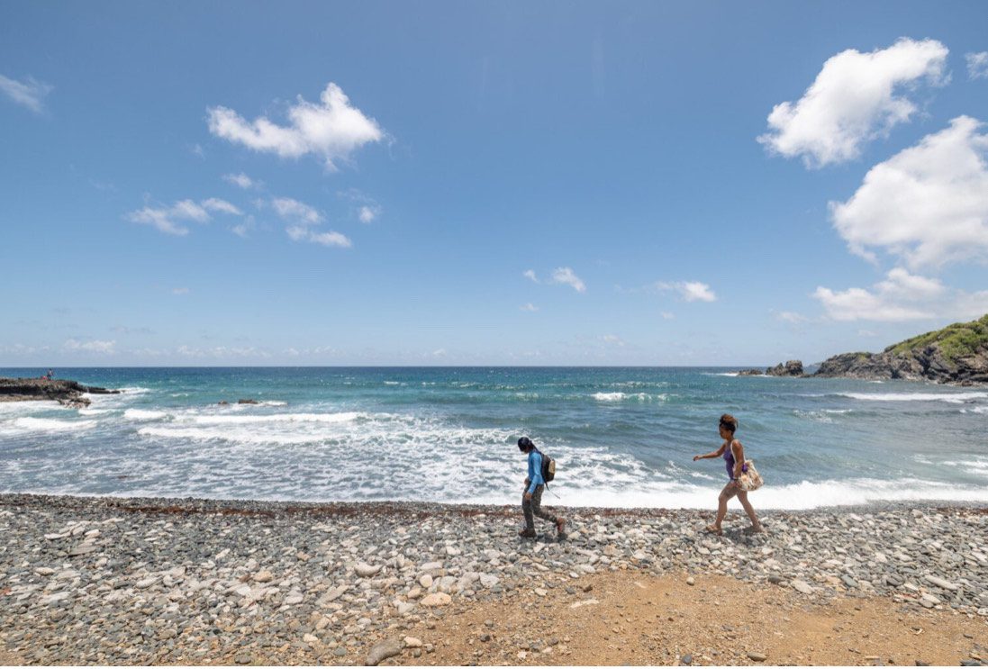 Hikers walk the rocky, wave-tossed shore of the Maroon Sanctuary Territorial Park in northwest St. Croix. (Photo courtesy DPNR)