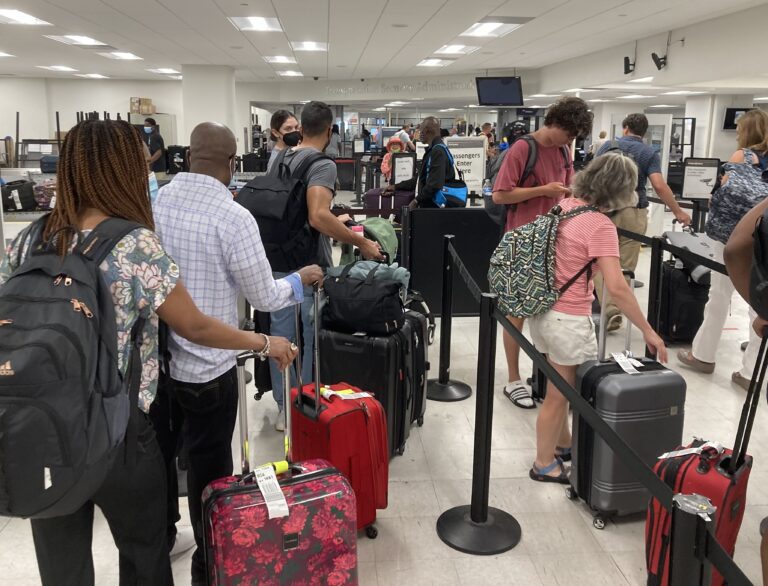 Passengers wait in line for Customs and Border Protection inspection before leaving St. Thomas. (Source photo by Mat Probasco)