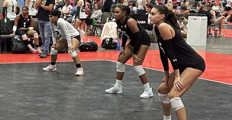 Island Heat 16-1, #2 Aryana Tutein, #5 Anna-Marie Figueroa, and #6 Ava Whitworth prepare to receive the serve in their match against GSA 16 National at the 2026 AAU National Volleyball Championships. (Photo by Mark J. Daniel)
