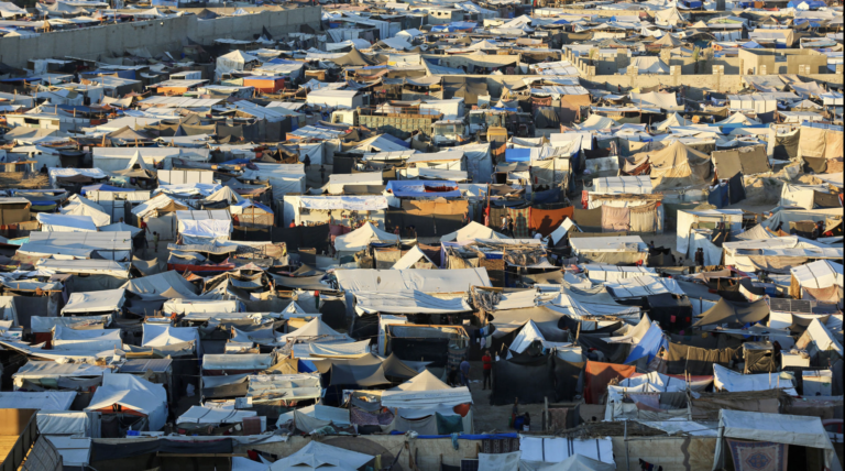 September 2024: Makeshift shelters in central Gaza  Photographer’s note: “I used to go almost every day to where I took this photo, to stay by myself and think about the nightmare we are living. As far as my eyes could see, there were tents.” 